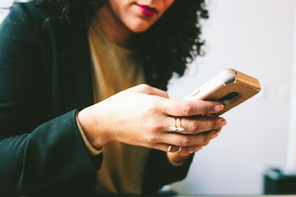 woman with a cell phone in her hands