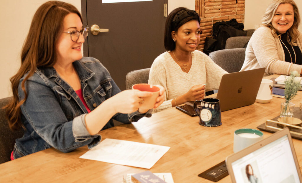 The Content Journey team hard at work discussing marketing strategy and content planning