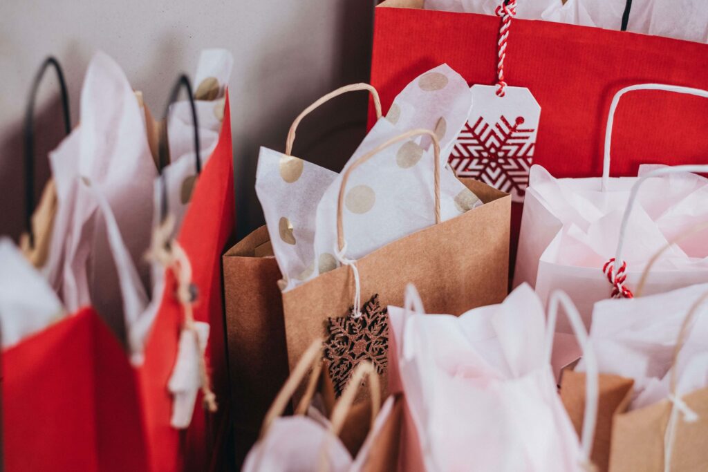 A bunch of gift bags all sitting together